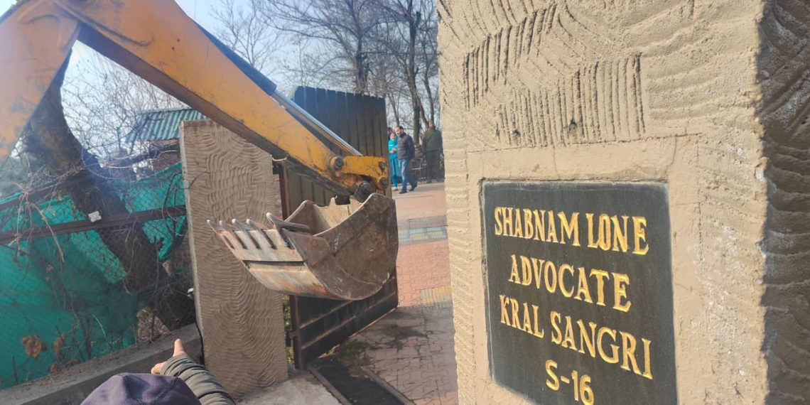 Bulldozer drive on property of ‘State land’ grabbed by Sajad Lone’s sister in Srinagar