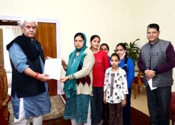 Lt Governor hands over appointment letter to martyr civilian Suneel Pandith’s wife