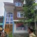District Police Kulgam attaches Two storied Residential house/commercial property worth appropriate market value of Rs 3 Crores of a notorious drug peddler on national highway in Qazigund, Kulgam