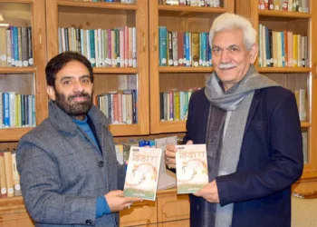 LG Sinha Releases Dr. Satish Vimal’s Hindi Poetry Book “Hindora”