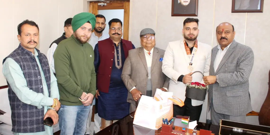 Deputy Chief Minister felicitates Bronze medalist, Rajat Singh
