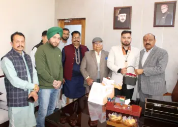 Deputy Chief Minister felicitates Bronze medalist, Rajat Singh