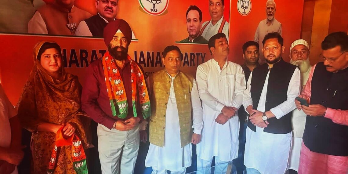Retired DySP Dara Singh joins BJP along with supporters at Srinagar.
