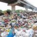 Garbage Dumping Near Shamshipora Bridge Raises Public Health Concerns; Residents Seek Immediate Action
